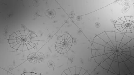 explosion of pieces of a concentric web on gray background, scatter in different directionsの写真素材