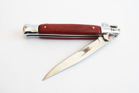 folding knife on a white backgroundの写真素材