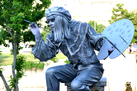 Live Sculpture. Artist entertains passers-by on a street in Gabrovo, Bulgaria May 19, 2017のeditorial素材