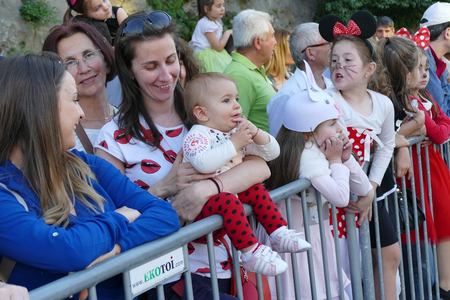 A diverse audience. Bored wait for the crowd of carnival viewers. Gabrovo, Bulgaria 20 May 2017のeditorial素材