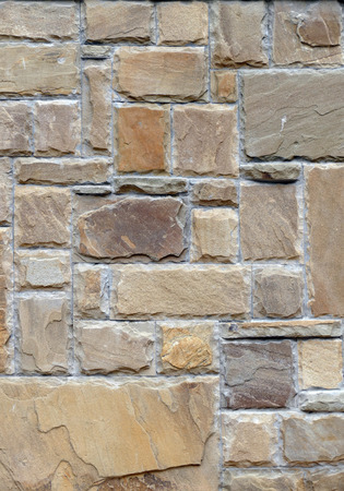 A wall lined with natural stone.の写真素材