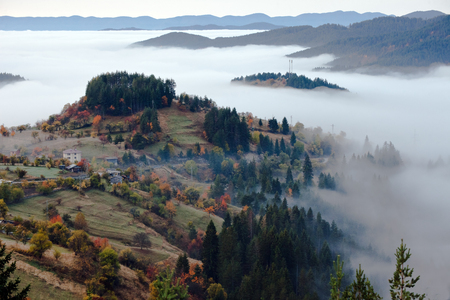 Autumn in the Rhodope Mountains, Bulgaria. Early morning. The mountain is covered with fog.の写真素材