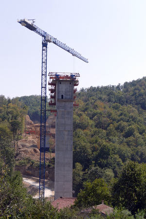 High-rise building. Bridge-based construction for motorway tower.の写真素材