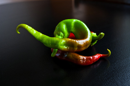 Fresh peppers of different shapes and colors.の写真素材