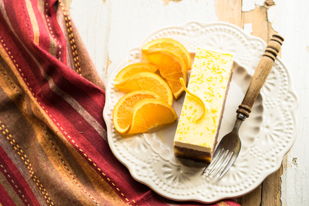 orange cake on a white plateの写真素材