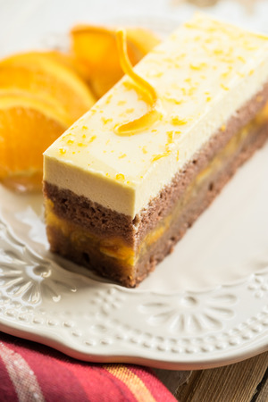 orange cake on a white plateの写真素材