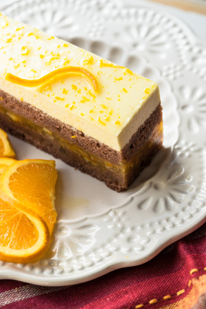 orange cake on a white plateの写真素材