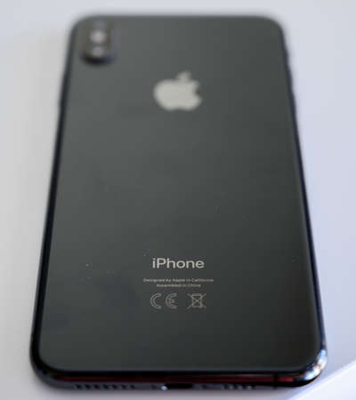 Belgrade, Serbia - February 28, 2020 - Back of the iPhone cellphone on white background.
