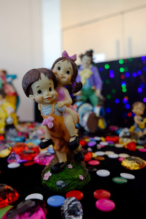 Little doll with blur backgroundの写真素材