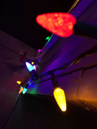 Multicolored String of Hanging Christmas Lightsの写真素材