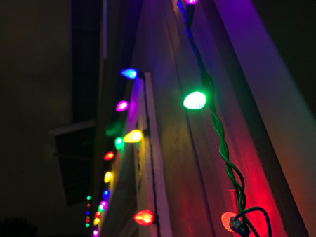 Multicolored String of Hanging Christmas Lightsの写真素材