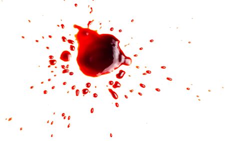 Blood on a white background. Drops and splashes of blood on a white background.の写真素材