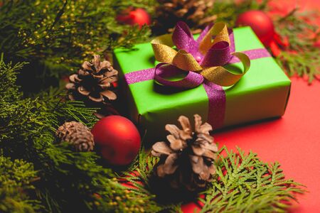 Festive composition on a red background. Template with place for text.の写真素材