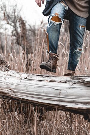 Guy hiking in comfortable hiking boots. Boots close-up stock photo.の写真素材