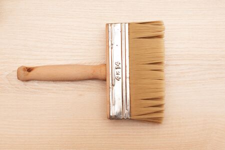 Big brush, wide close-up. Stock photo of a construction brush.