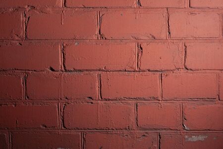 Maroon brick wall texture. Stock photo brick wall in burgundy color.
