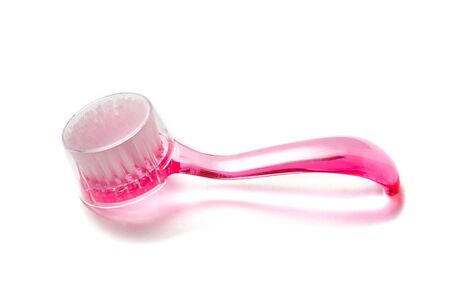 Dust brush, tool manicure beauty salon. Plastic pink brush for manicure and pedicure isolated on a white background. Tool for cleaning dust from gel polish.の写真素材