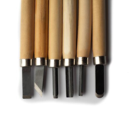 Wood carving tools isolated on a white background. Set of various cuts.の写真素材