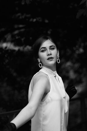 Portrait of a girl in vintage style. Fashion of the past.