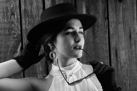 Portrait of a girl in vintage style. Fashion of the past.