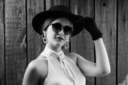 Portrait of a girl in vintage style. Fashion of the past.の写真素材