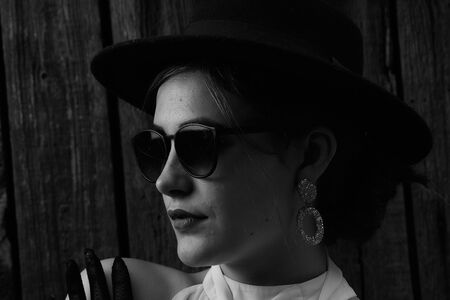 Portrait of a girl in vintage style. Fashion of the past.