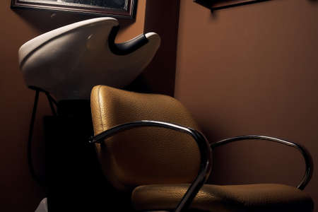 Sink and chair for washing hair in a barbershop. Hair care in the salon. Nobody.の写真素材