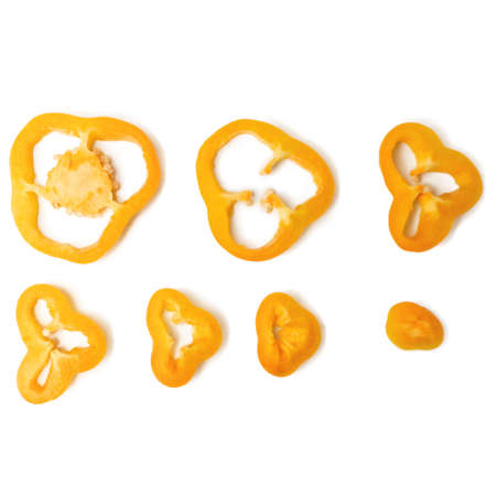 Chopped orange bell pepper isolated on a white background.の写真素材