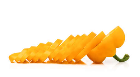 Chopped orange bell pepper isolated on a white background.の写真素材