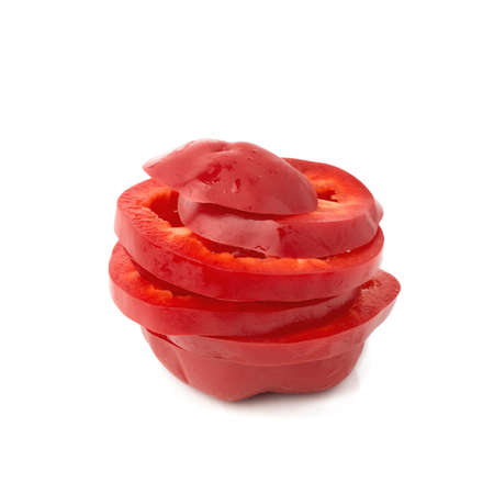 Chopped red bell pepper isolated on a white background.の写真素材