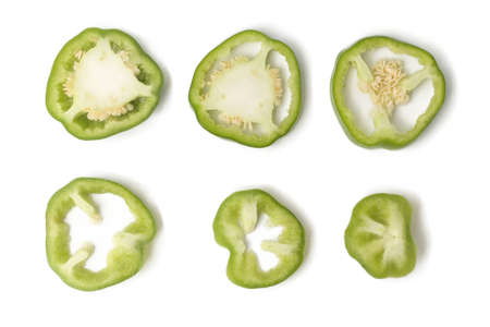 Sliced â€‹â€‹green bell pepper isolated on a white background.