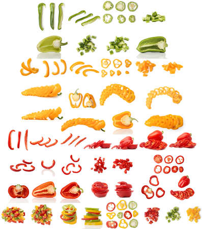 Sliced ââbell pepper isolated on white background. Set of assorted chopped capsicum, different colors of the vegetable. Cooking food, various cutting shapes for design with shadows and reflections.の写真素材