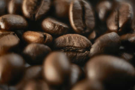 Coffee beans close up, background wallpaper. Macro photo of coffee.の写真素材