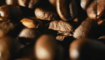 Coffee beans close up, background wallpaper. Macro photo of coffee.の写真素材