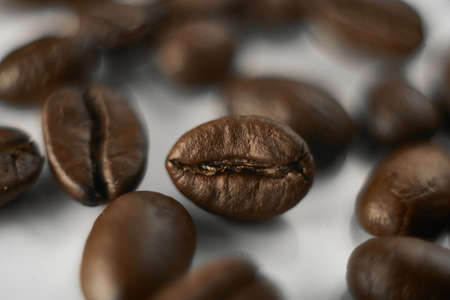 Coffee beans close up, background wallpaper. Macro photo of coffee.の写真素材