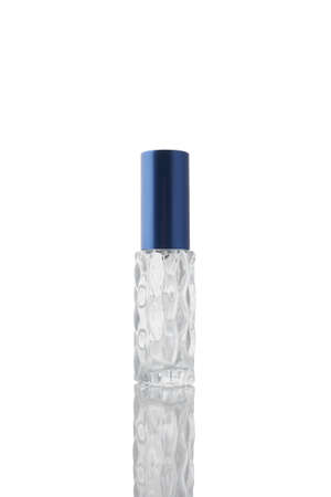 Transparent bottle with perfume isolated on white background.の写真素材