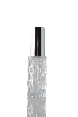 Transparent bottle with perfume isolated on white background.の写真素材