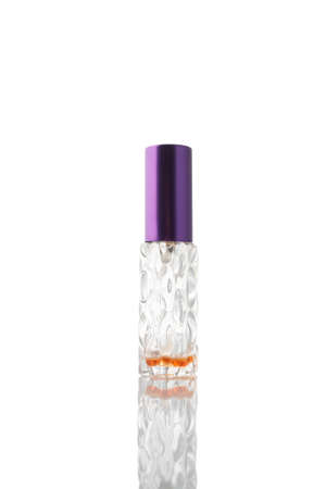 Transparent bottle with perfume isolated on white background.の写真素材