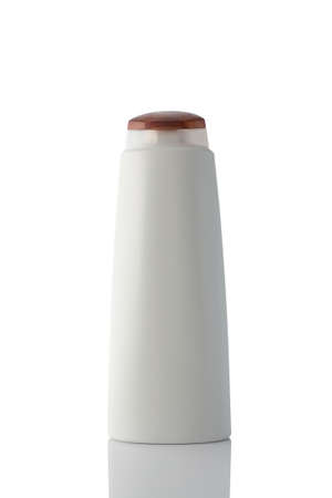White plastic bottle shampoo or shower gel isolated on a clean white background, with reflection.の写真素材