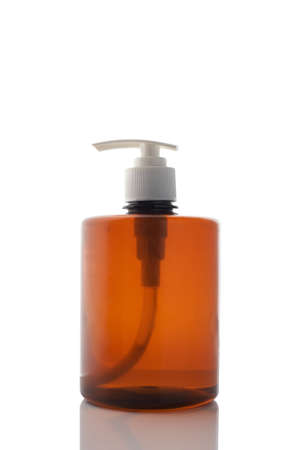 Liquid soap with a dispenser in a bottle on a white background.の写真素材