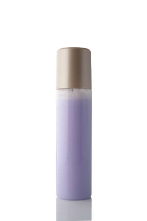 Spray bottle with colored liquid isolated on white background.の写真素材