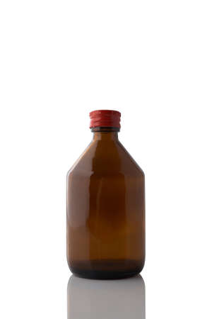 Glass jar of alcohol isolated on white background, red cap.の写真素材