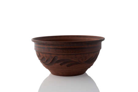 Clay bowl isolated on white background.の写真素材