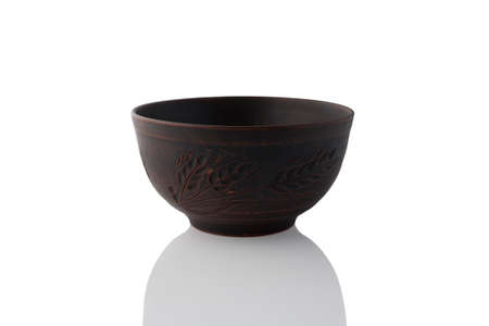 Clay bowl isolated on white background.の写真素材