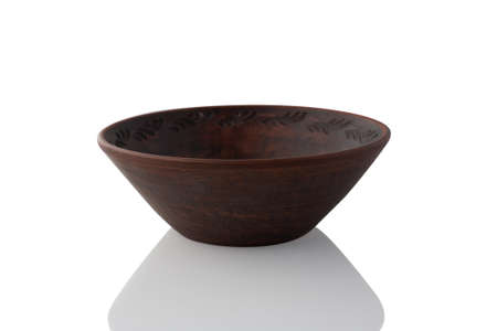 Clay bowl isolated on white background.の写真素材