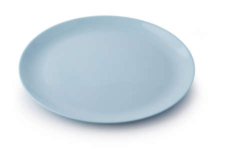 Flat empty plate isolated on white background.の写真素材