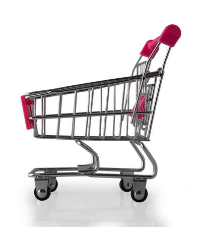 Empty miniature supermarket trolley isolated on a white background. Side view.の写真素材