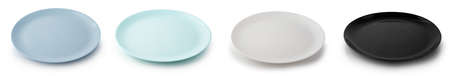 Set of flat empty plates of different colors isolated on white background. Side view.の写真素材