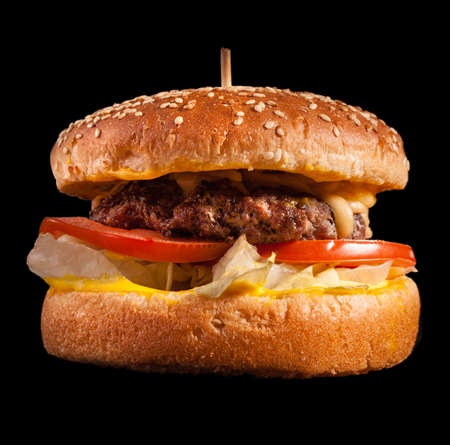 Burger isolated on black background.の写真素材