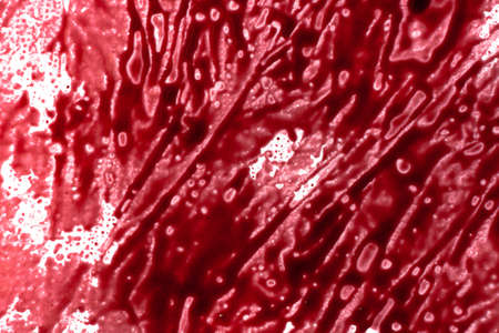 Bloody spotted background texture with smudges of fresh blood.
